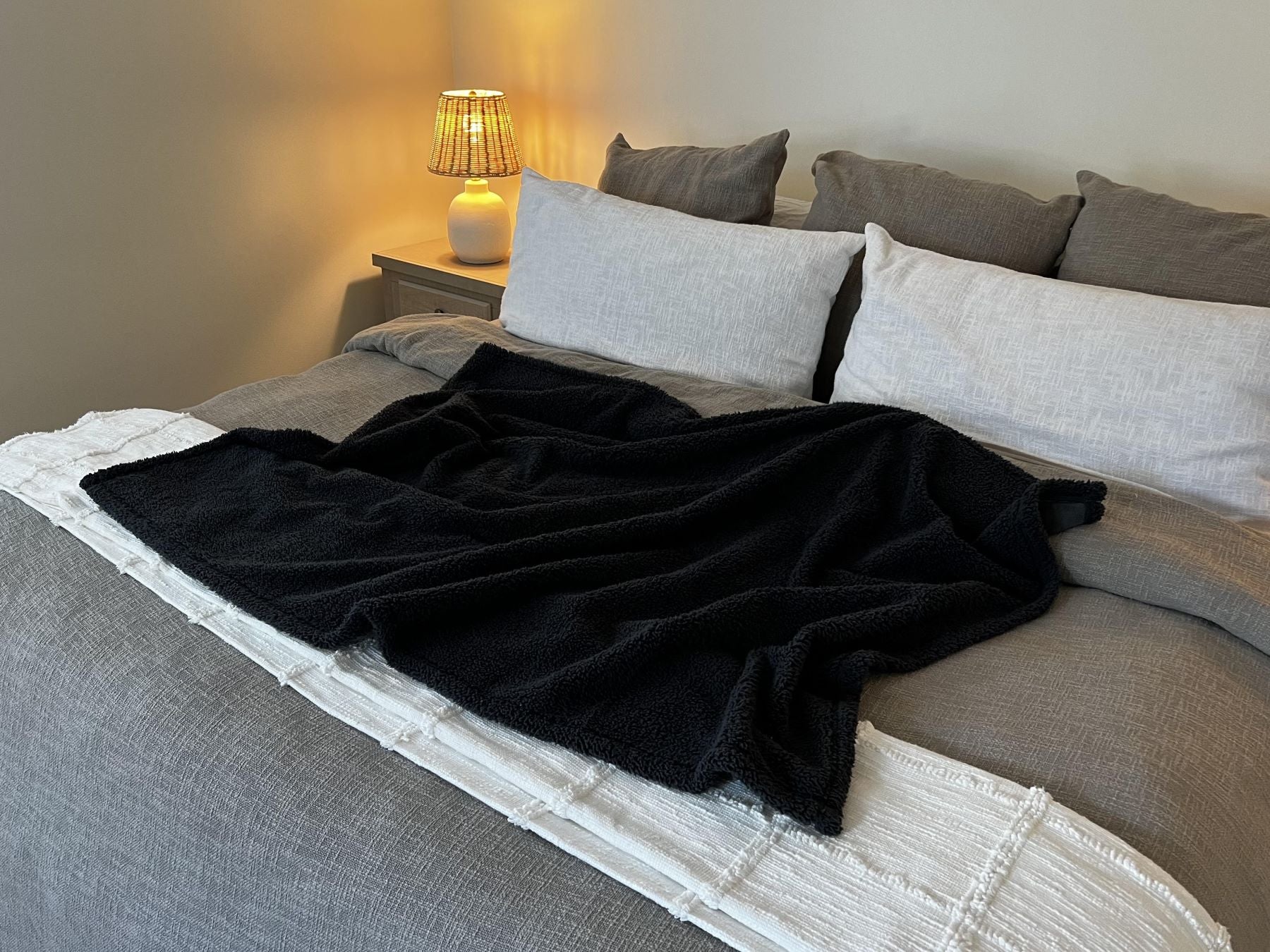 Layered blankets on online bed