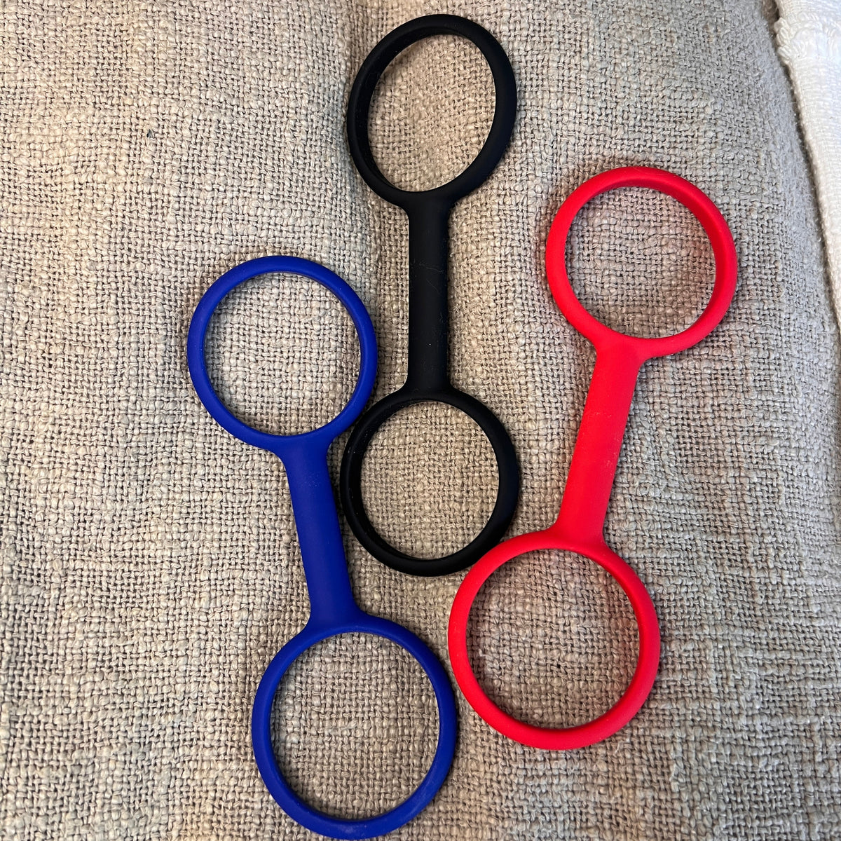 Esposas rubber handcuffs showing the stretchy material