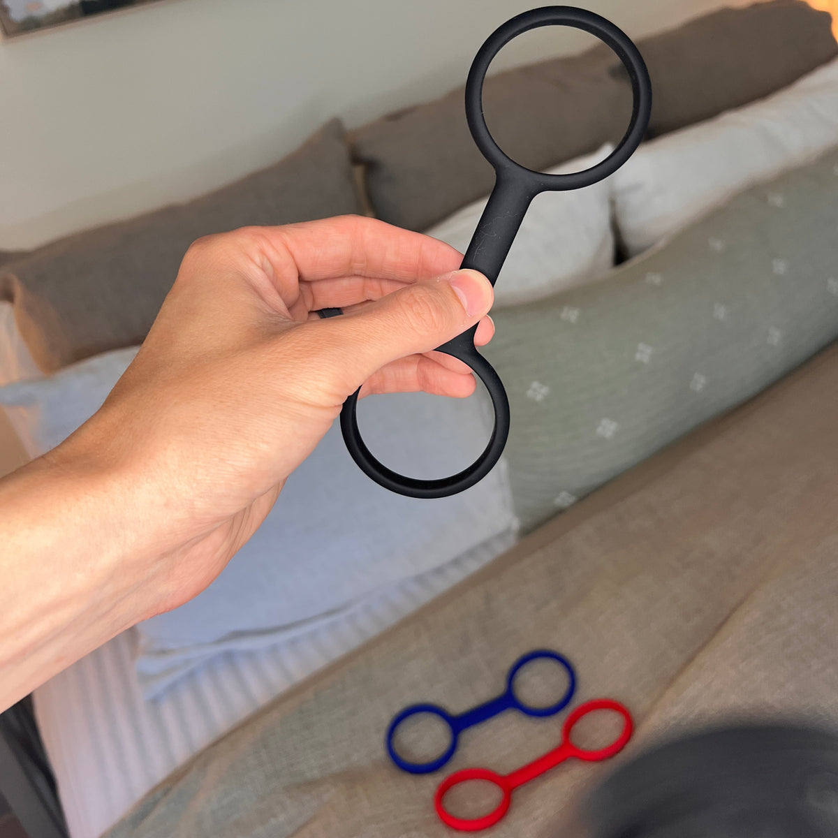 Esposas rubber handcuffs, angled view